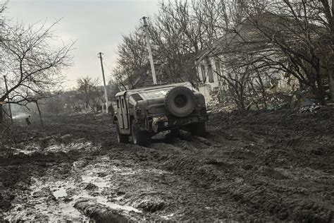 cleaning mud Ukraine|mud damage in ukraine.